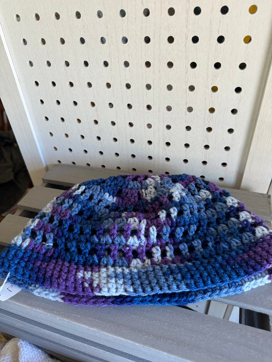 Crocheted purple and blue hat